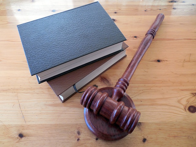 gavel next to stack of books